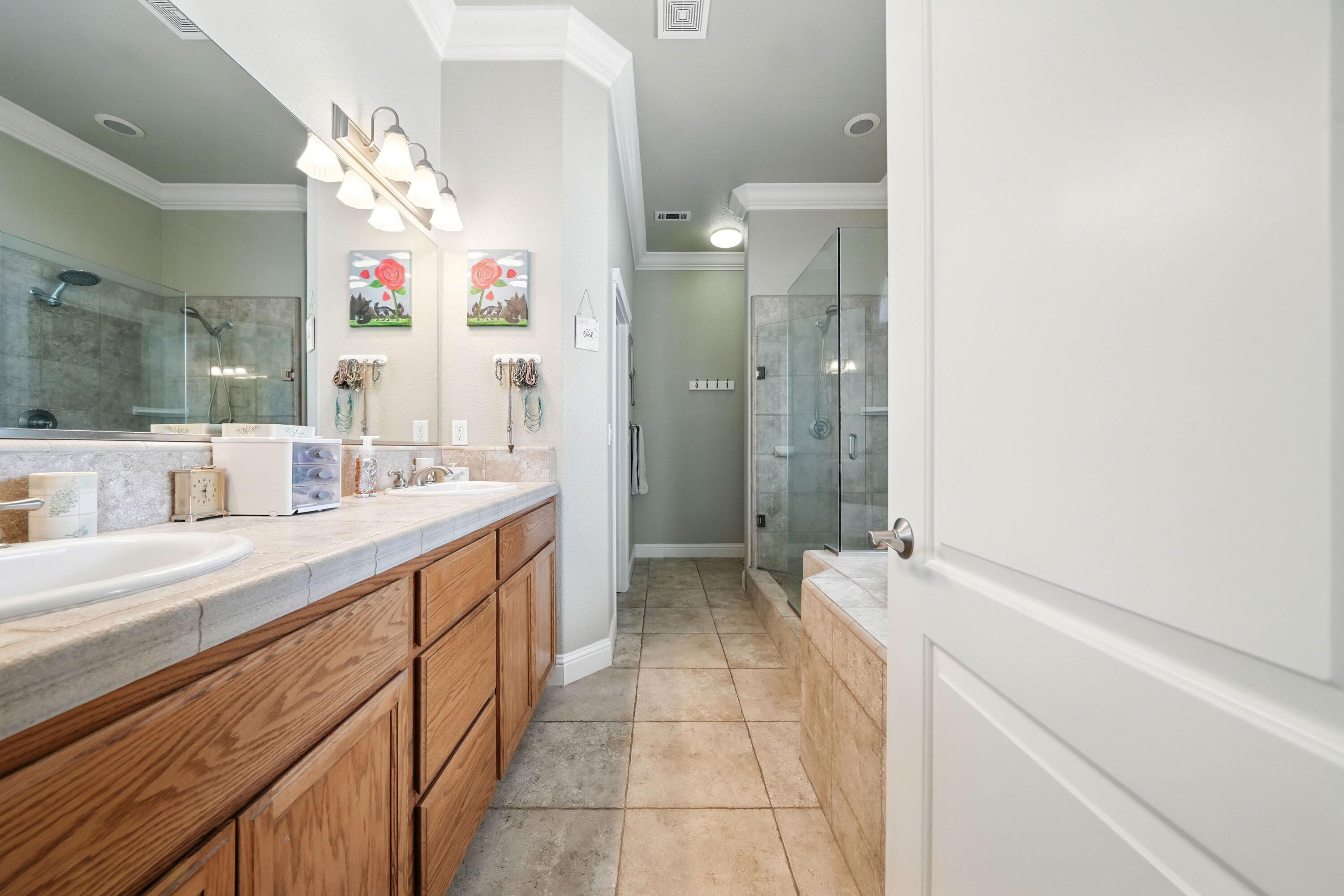 7777 Pit Road Redding, CA 96001 - Photo 11 of 27 a spacious bathroom with a sink a mirror and a shower