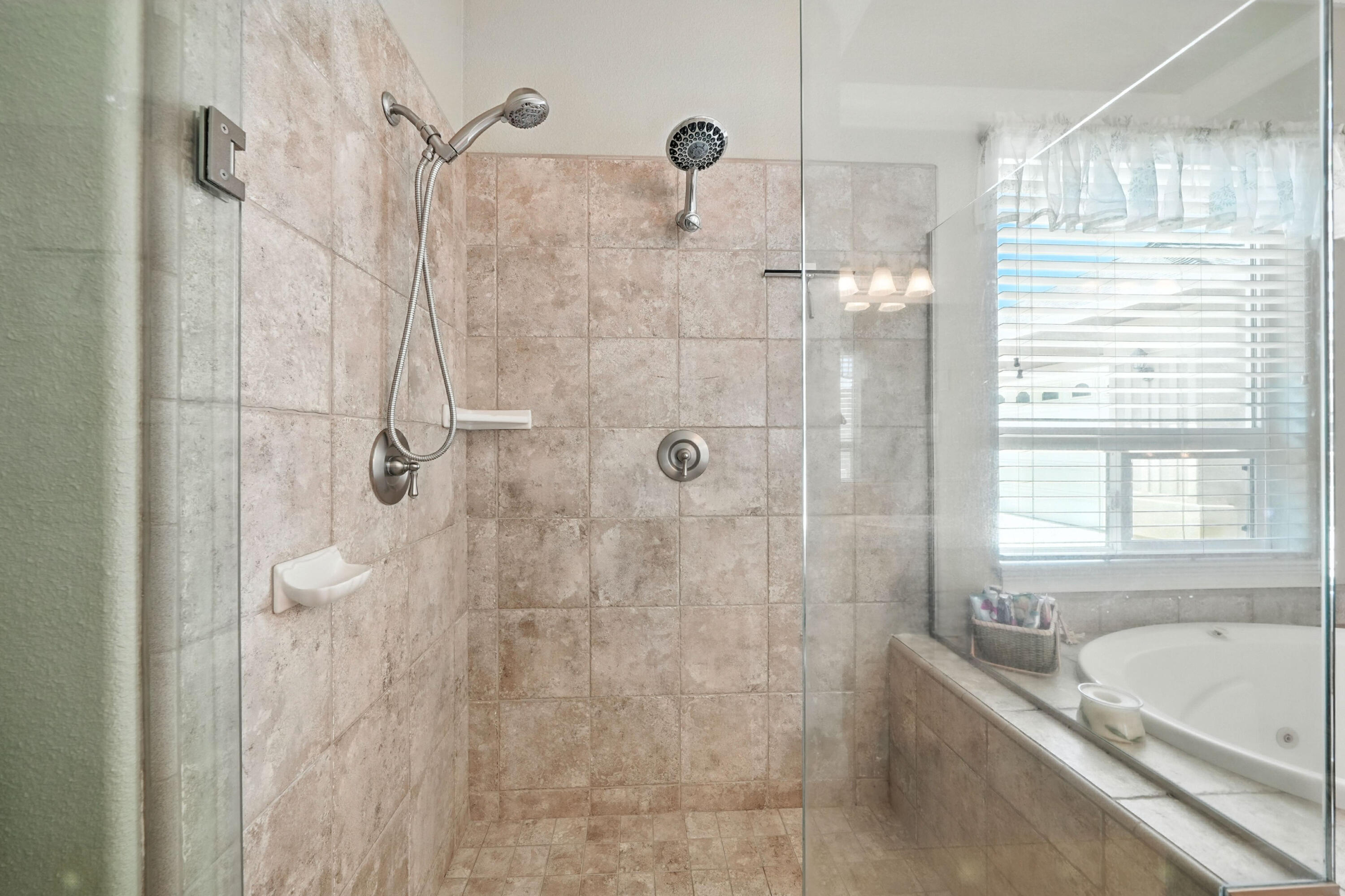 7777 Pit Road Redding, CA 96001 - Photo 14 of 27 a bathroom with a tub a window and a shower