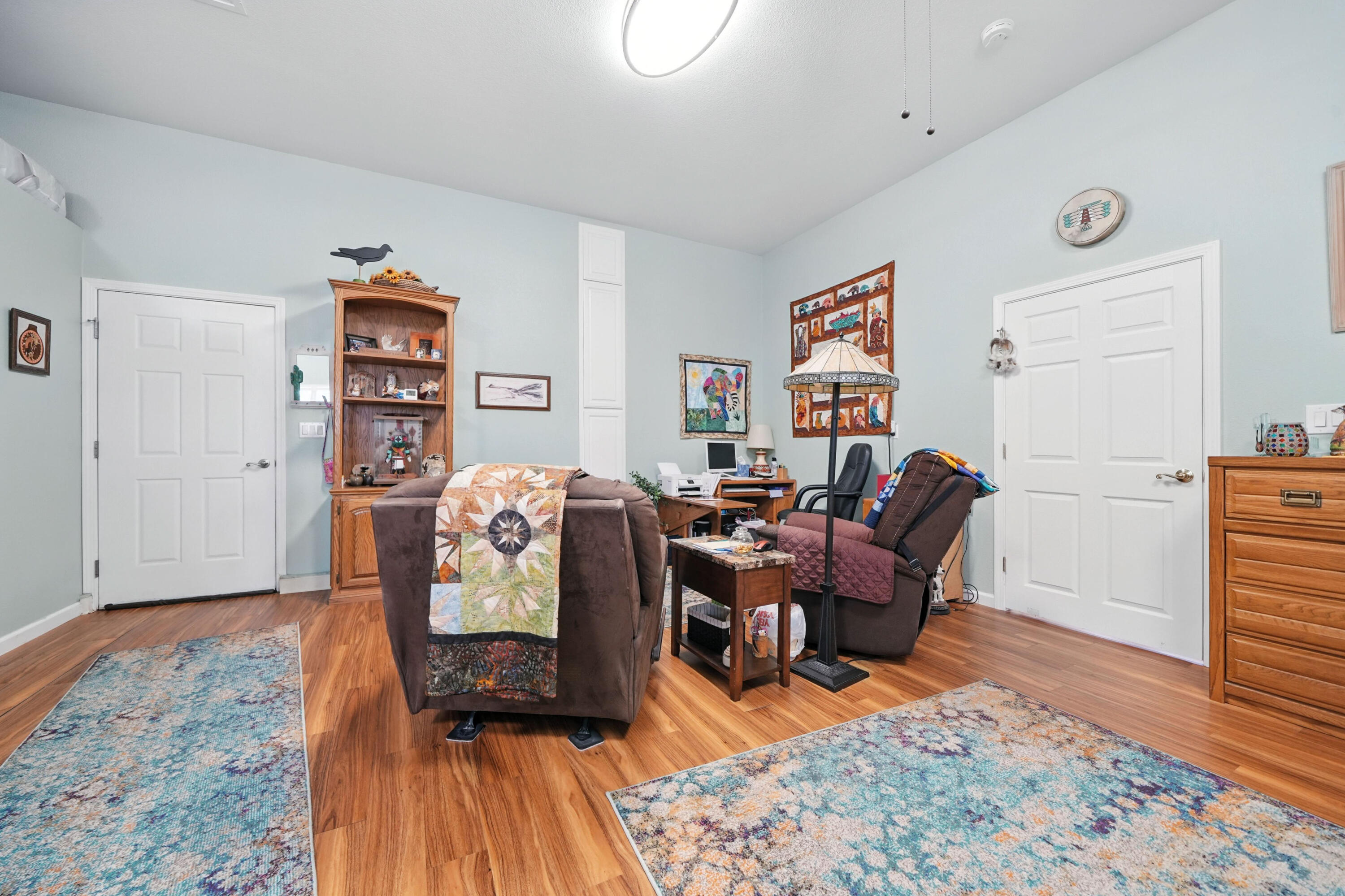 7777 Pit Road Redding, CA 96001 - Photo 20 of 27 a living room with furniture and wooden floor