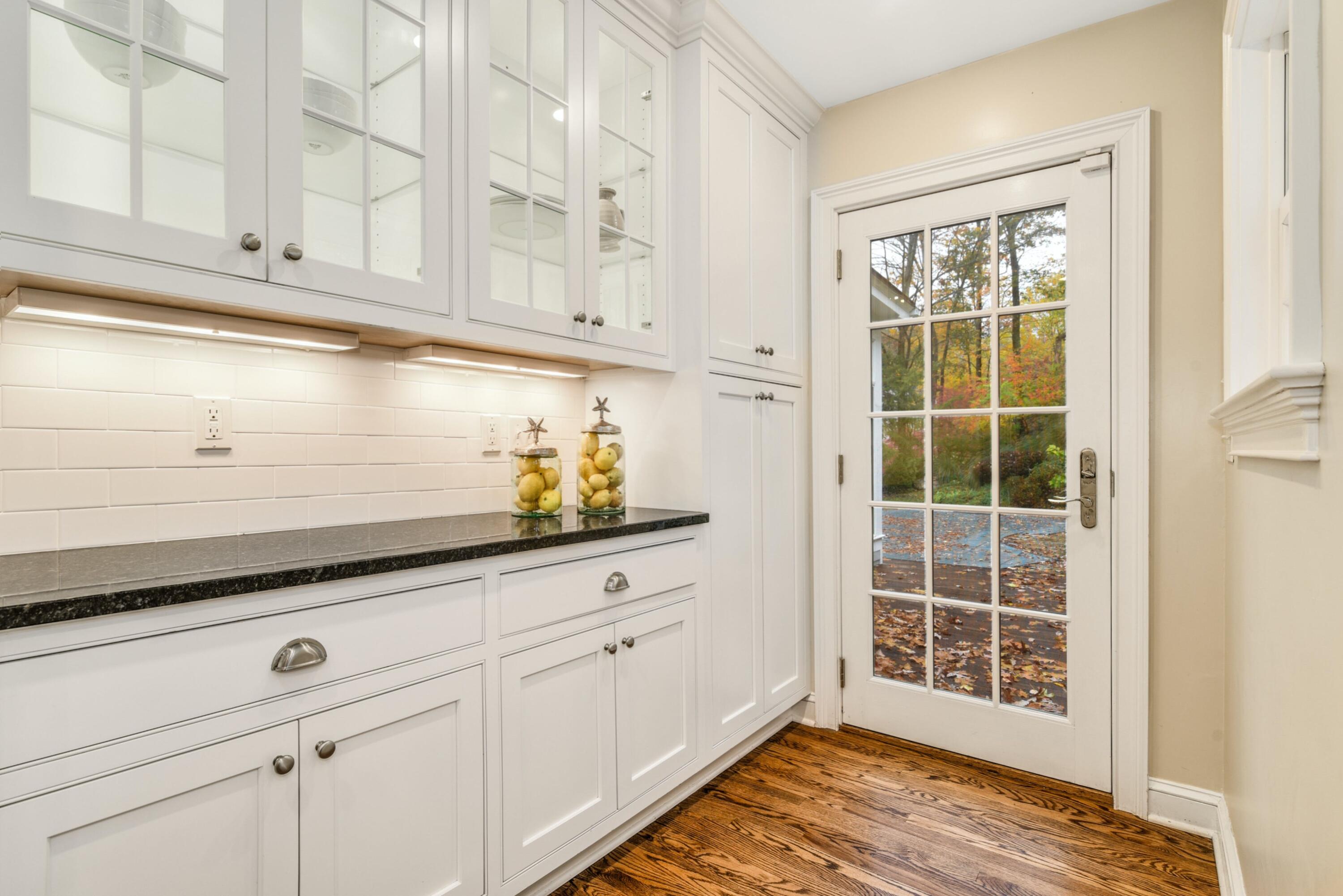 22 Stony Brook Road Darien, CT 06820 - Photo 12 of 33 a view of white cabinets and window