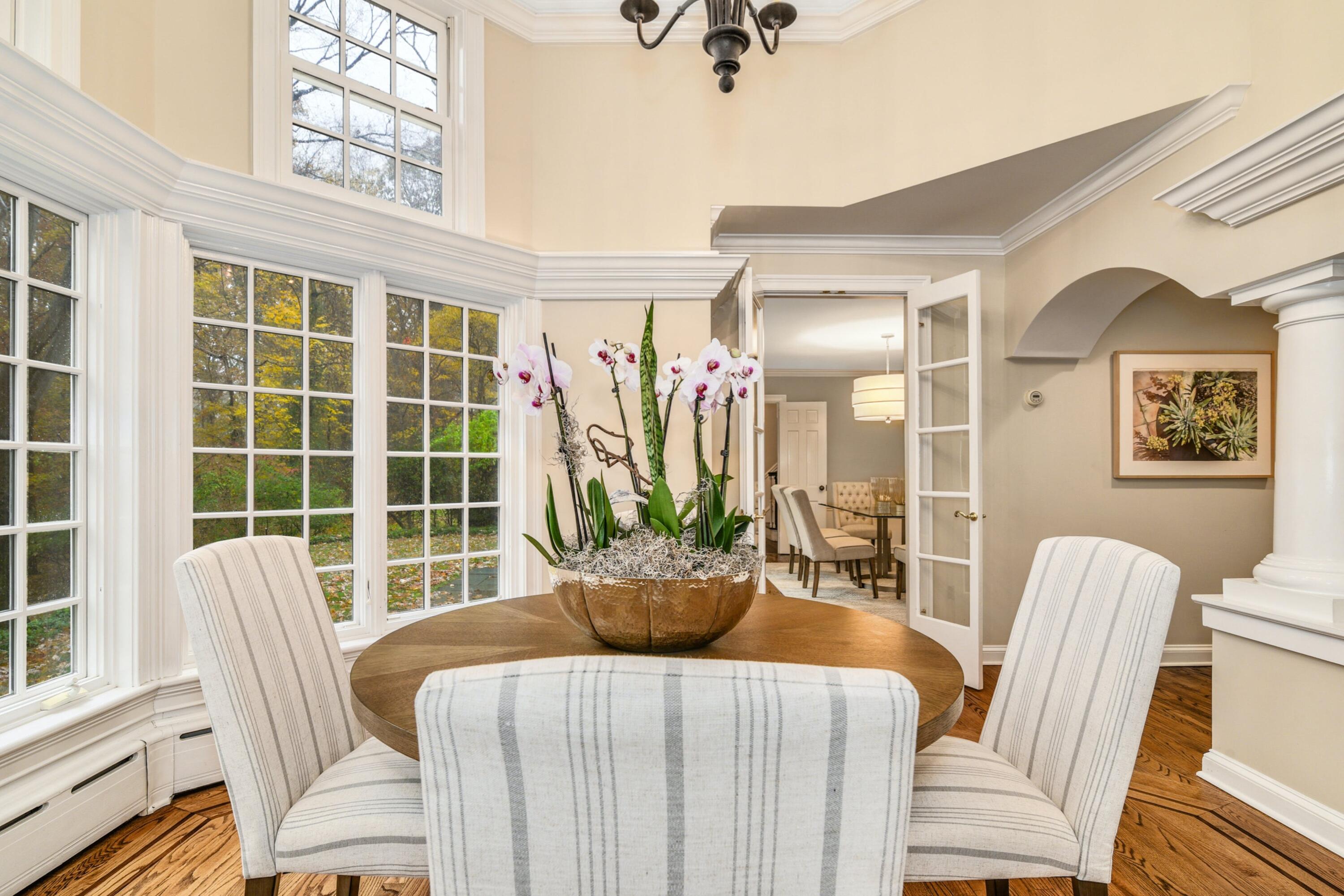 22 Stony Brook Road Darien, CT 06820 - Photo 14 of 33 a view of a dining room with furniture and wooden floor