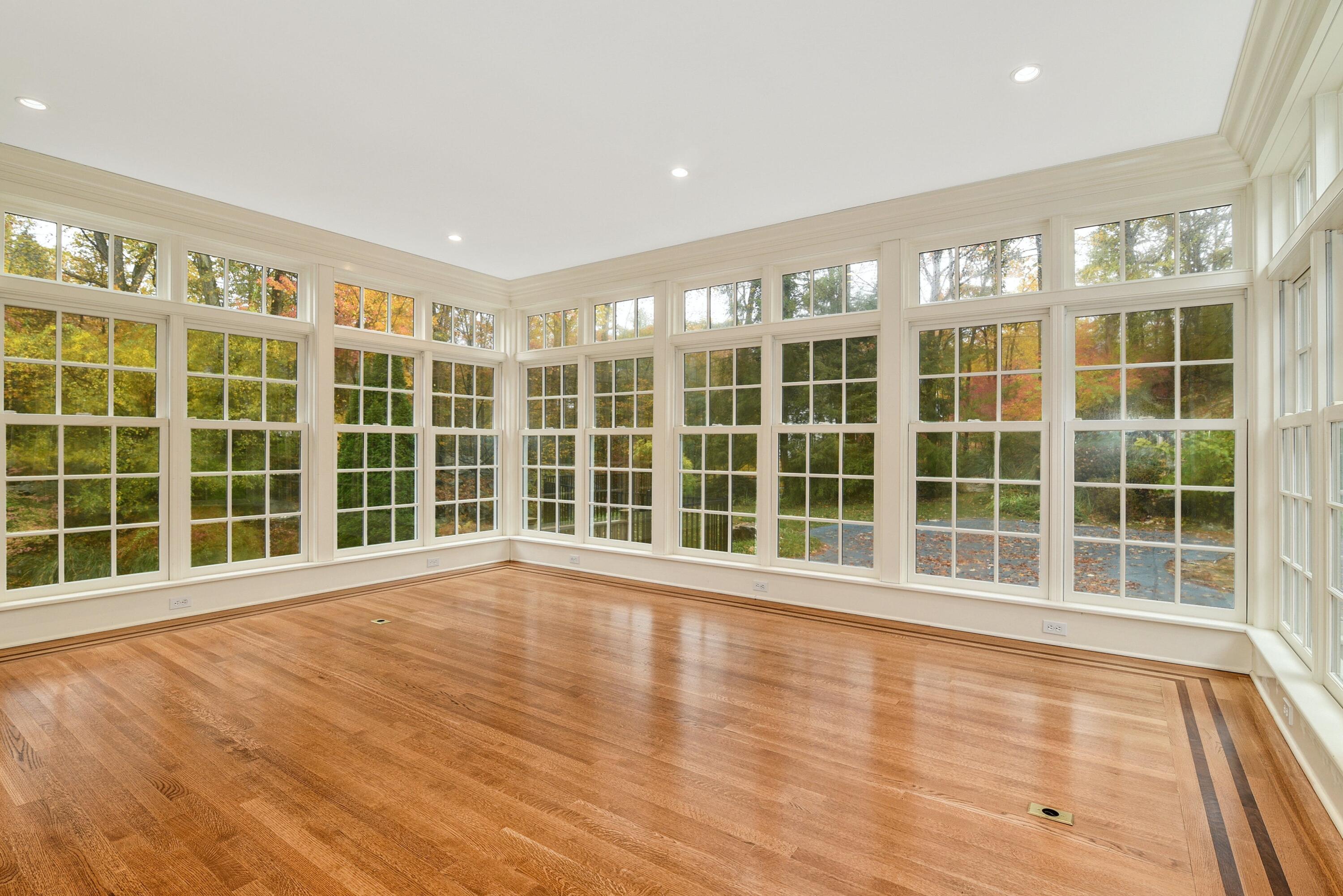 22 Stony Brook Road Darien, CT 06820 - Photo 19 of 33 a view of an empty room with a large window