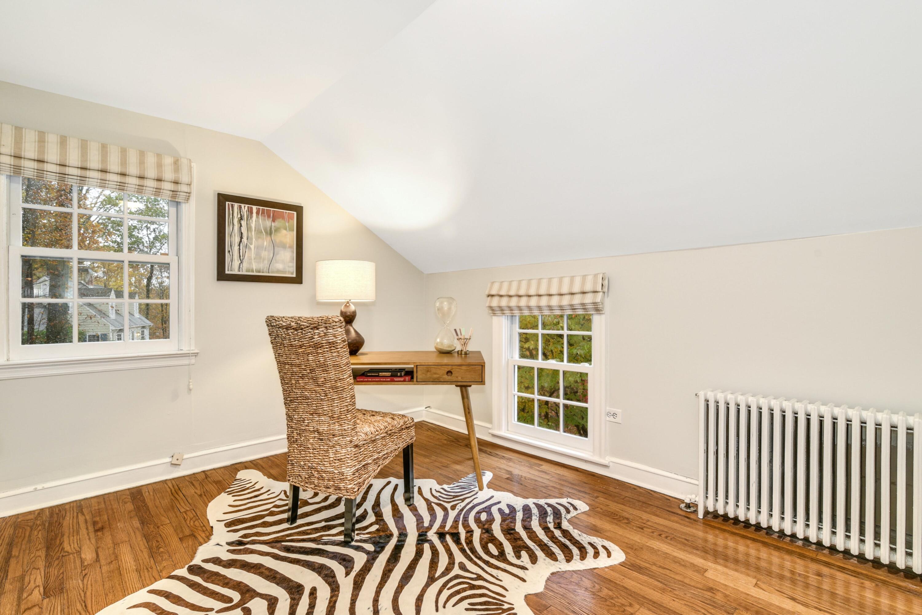 22 Stony Brook Road Darien, CT 06820 - Photo 29 of 33 a view of a workspace with furniture and a window