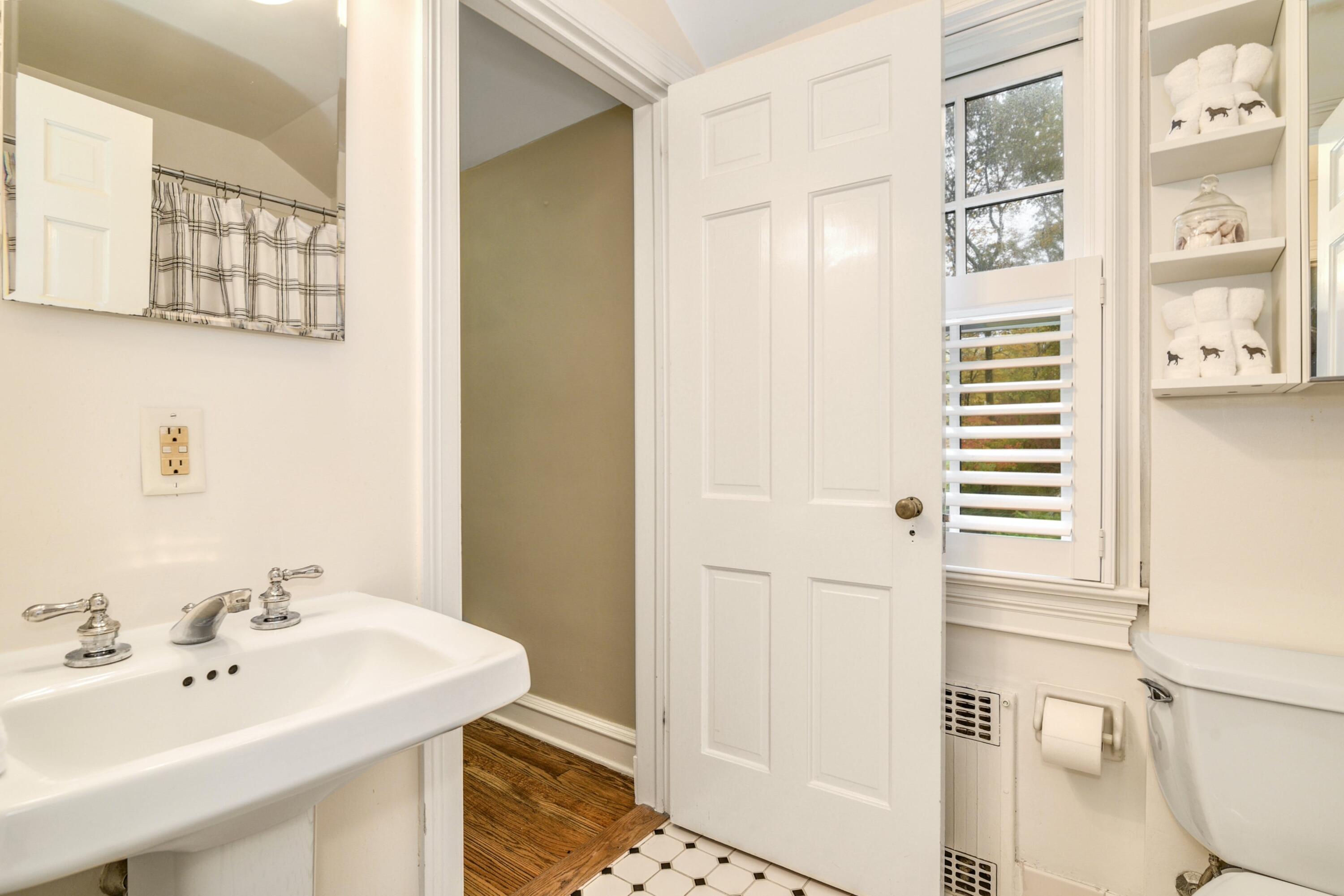 22 Stony Brook Road Darien, CT 06820 - Photo 30 of 33 a bathroom with a sink a toilet and shower
