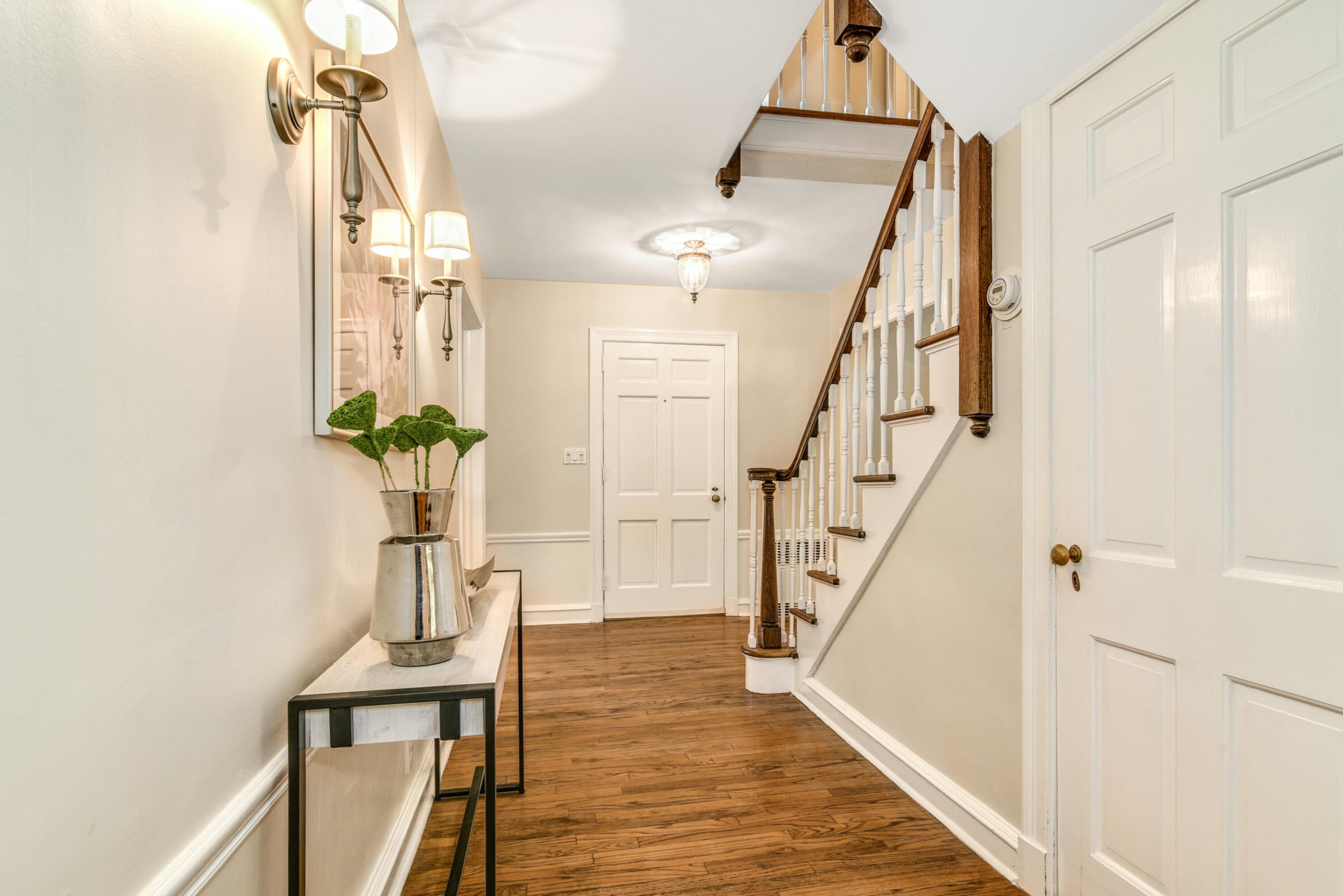 22 Stony Brook Road Darien, CT 06820 - Photo 3 of 33 a view of entryway and hall with wooden floor
