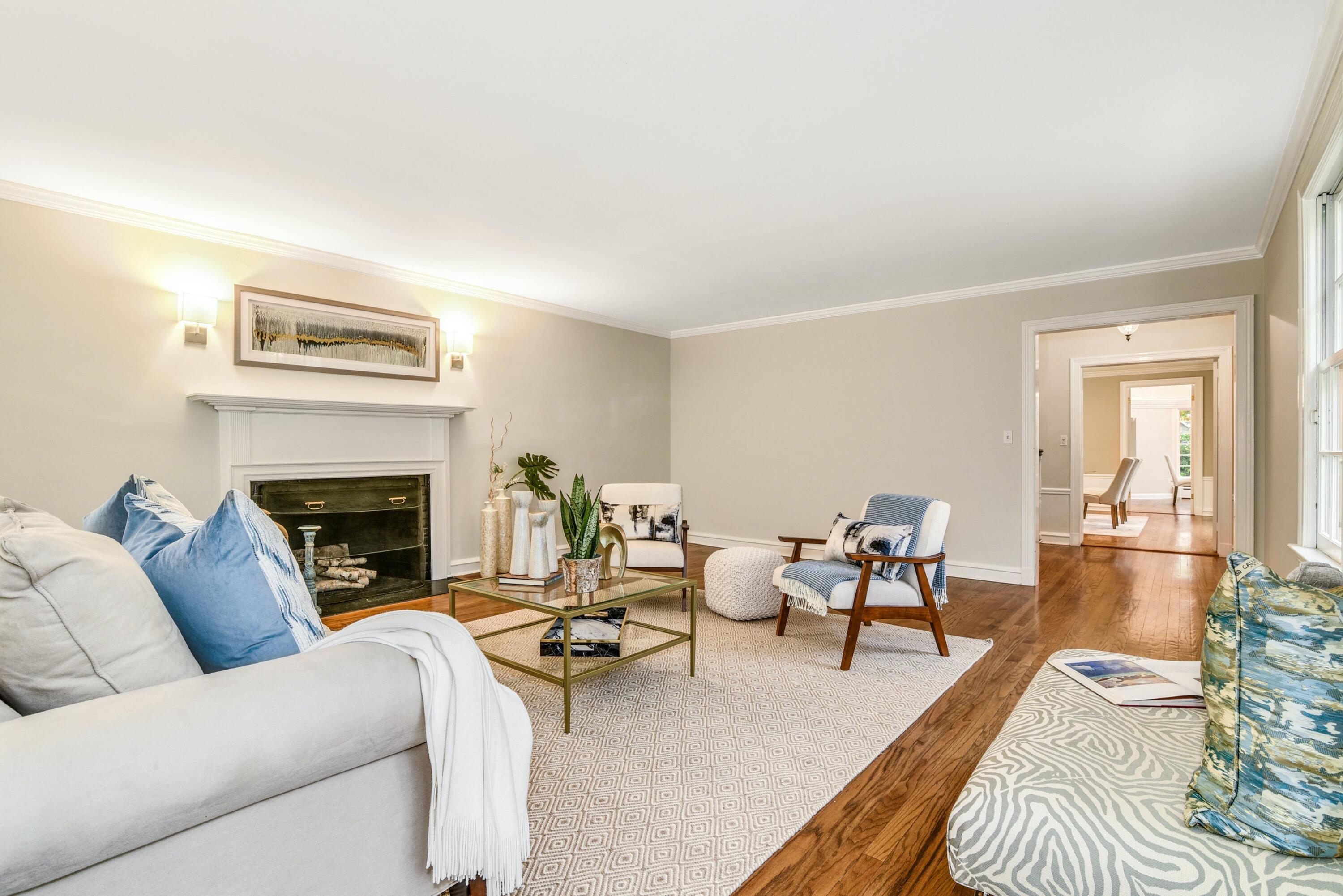 22 Stony Brook Road Darien, CT 06820 - Photo 5 of 33 a living room with furniture and a fireplace