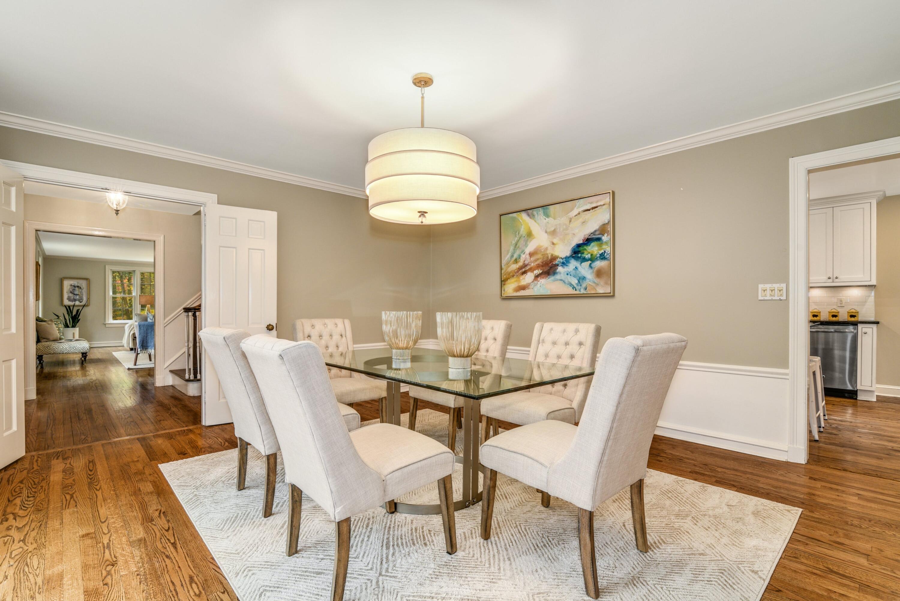22 Stony Brook Road Darien, CT 06820 - Photo 6 of 33 a view of a dining room with furniture and wooden floor