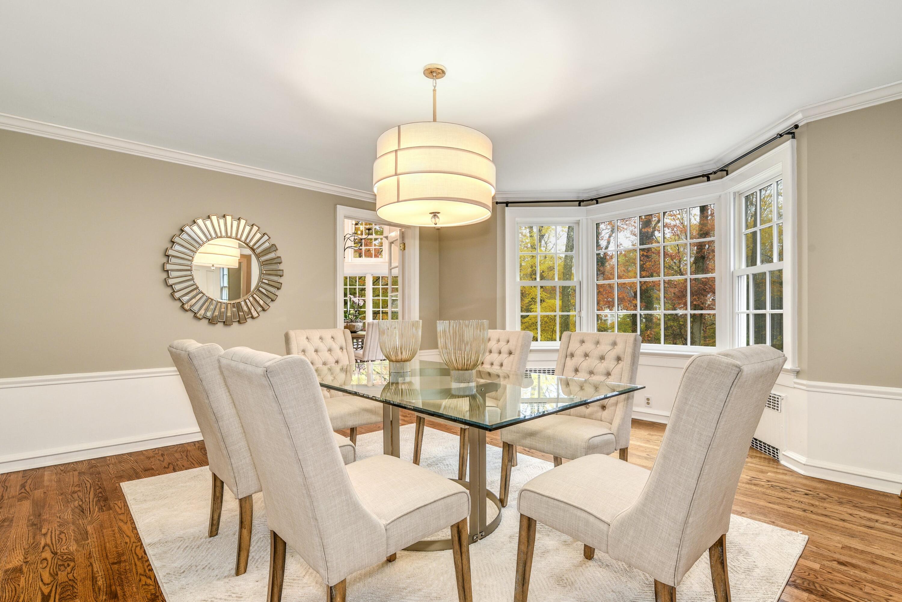 22 Stony Brook Road Darien, CT 06820 - Photo 7 of 33 a view of a dining room with furniture window and wooden floor