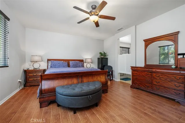 a room with furniture and wooden floor