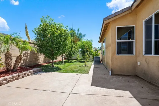 a view of a back yard of the house