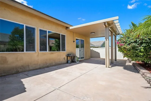a view of a house with a patio