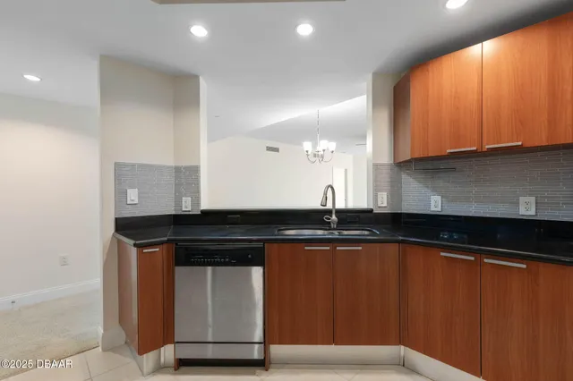 an empty room with a empty space and a ceiling fan