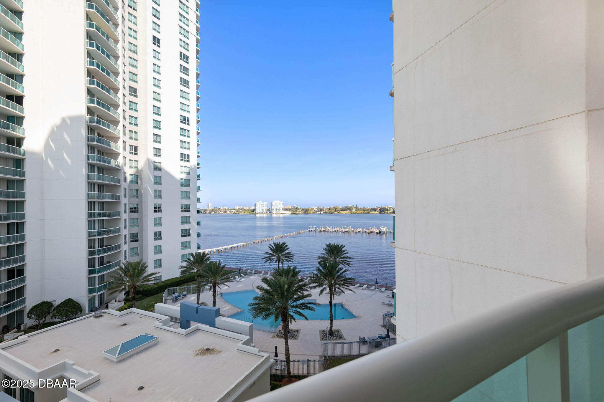 231 Riverside Drive, Unit 608 Holly Hill, FL 32117 - Photo 22 of 74 a view of balcony with furniture and city view
