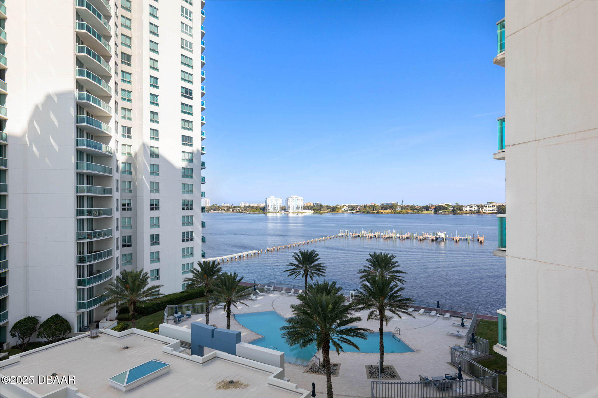 231 Riverside Drive, Unit 608 Holly Hill, FL 32117 - Photo 4 of 74 a view of a lake and a city