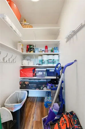 a room with storage and a table