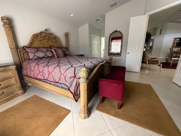 a view of a dinning table and chairs in patio