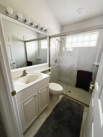 a view of an outdoor space and tennis court