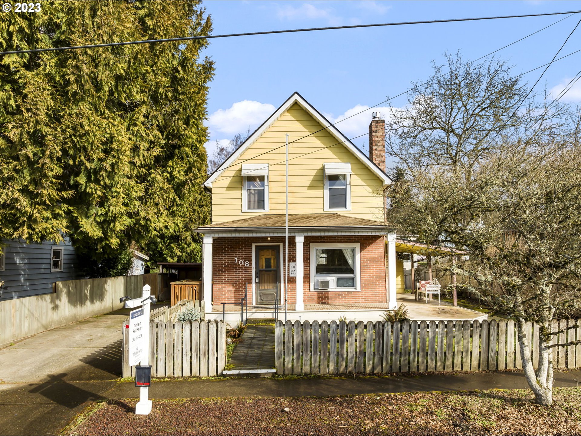 108 South 4th Avenue Ridgefield, WA 98642 - Photo 1 of 32 a front view of a house with a porch