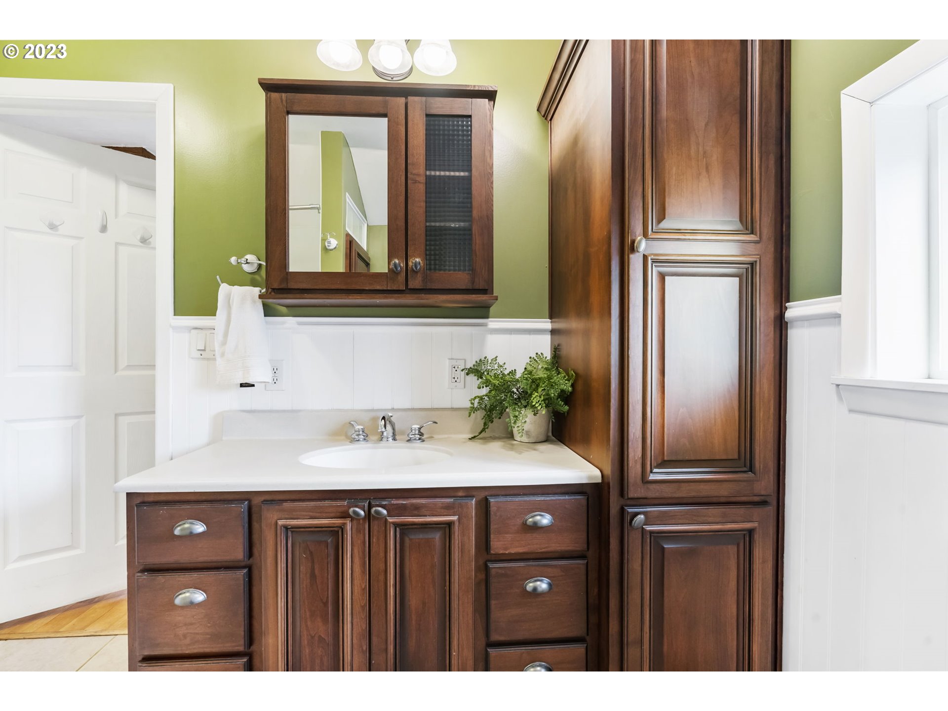 108 South 4th Avenue Ridgefield, WA 98642 - Photo 16 of 32 a bathroom with a sink and a mirror