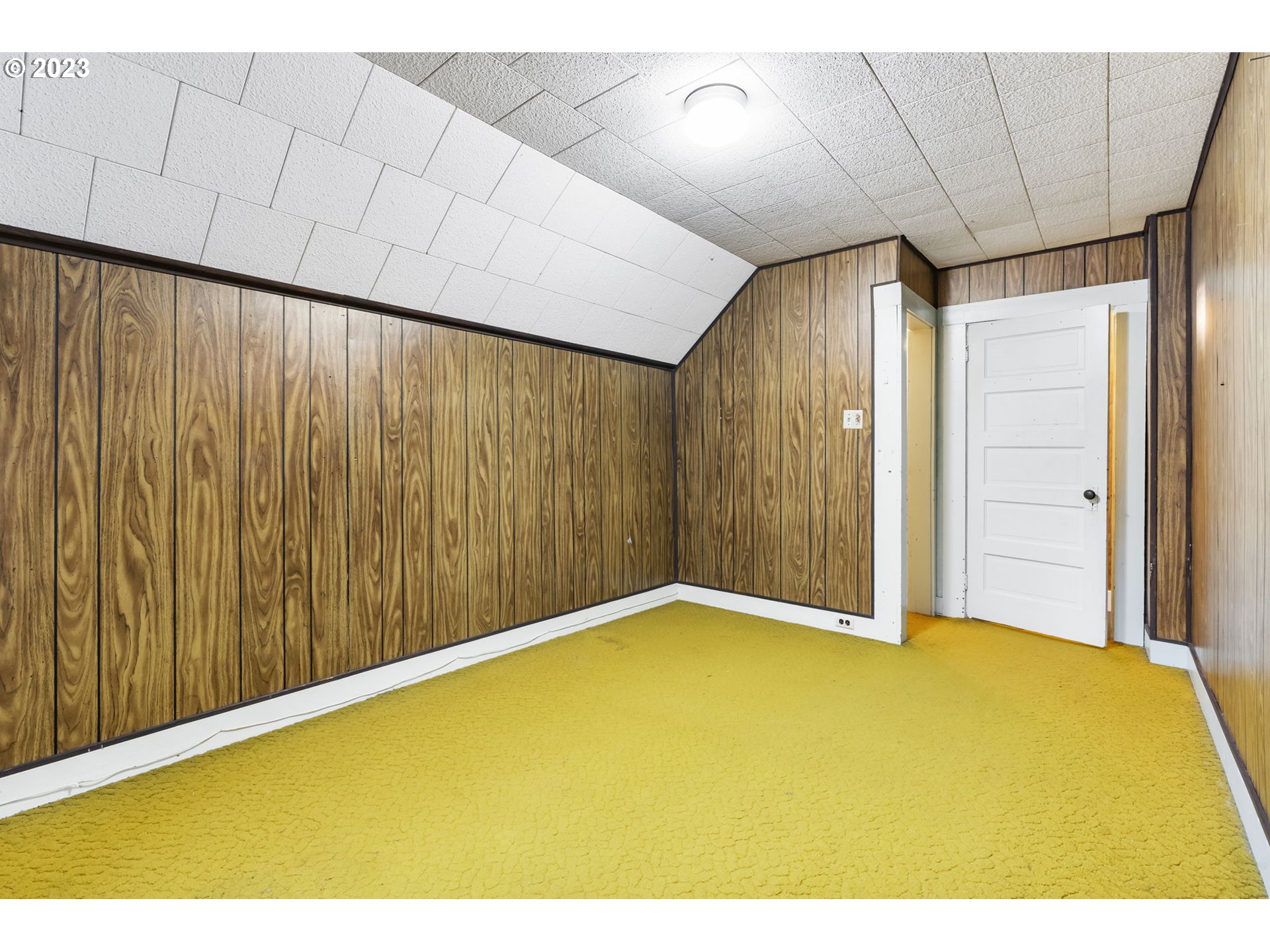 108 South 4th Avenue Ridgefield, WA 98642 - Photo 23 of 32 a view of empty room with wooden floor