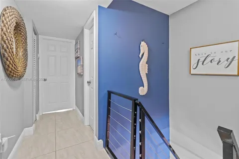 a view of a hallway with entryway