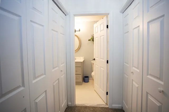 a view of a bathroom with a shower and a bathroom