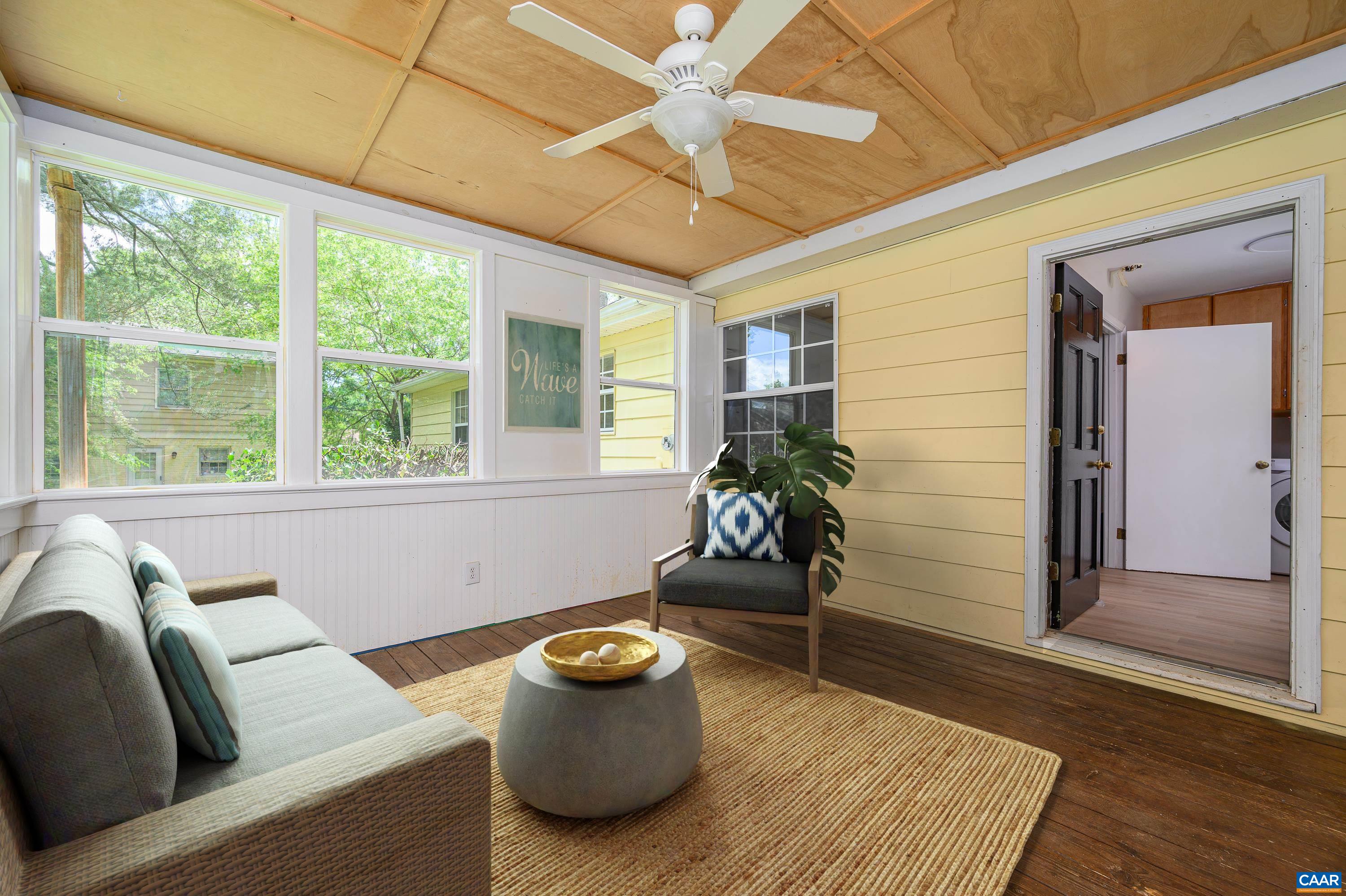 109 Middlesex Drive Charlottesville, VA 22901 - Photo 11 of 27 a living room with furniture and a potted plant