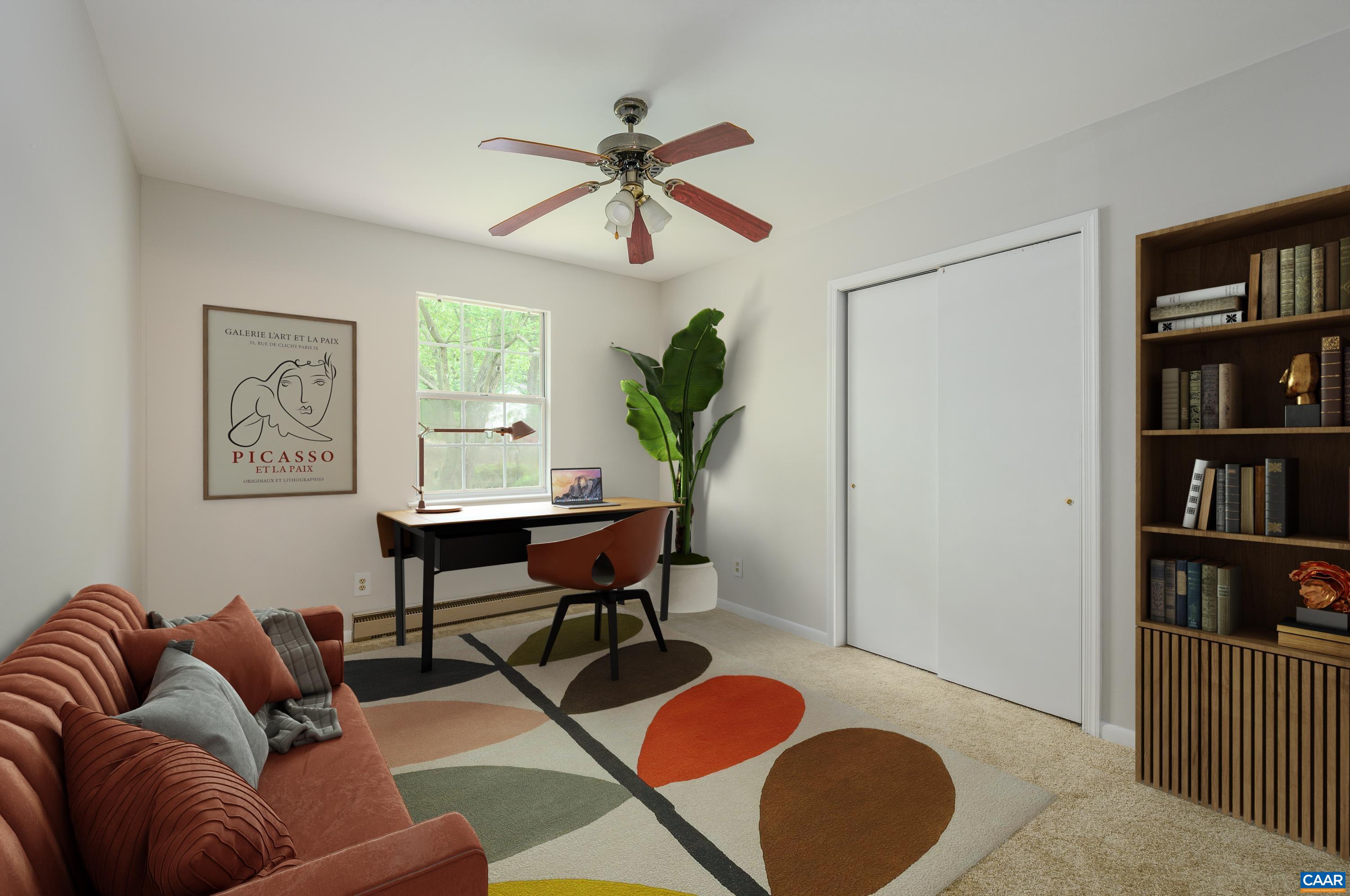 109 Middlesex Drive Charlottesville, VA 22901 - Photo 16 of 27 a living room with furniture a rug and a window