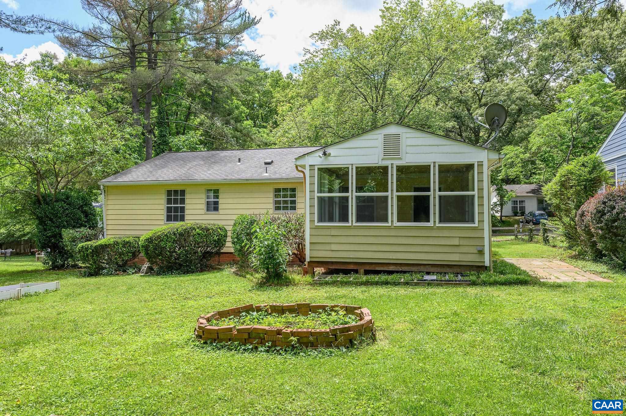 109 Middlesex Drive Charlottesville, VA 22901 - Photo 20 of 27 a front view of a house with a yard