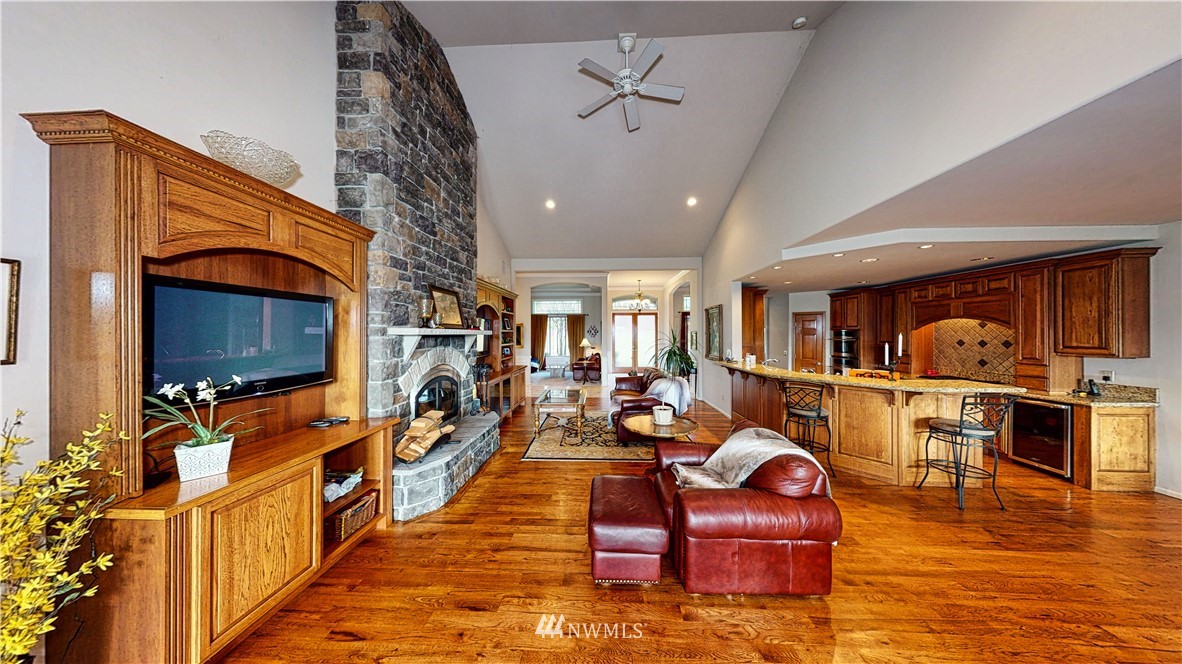 4830 Fobes Road Snohomish, WA 98290 - Photo 17 of 35 a living room with fireplace furniture and a flat screen tv