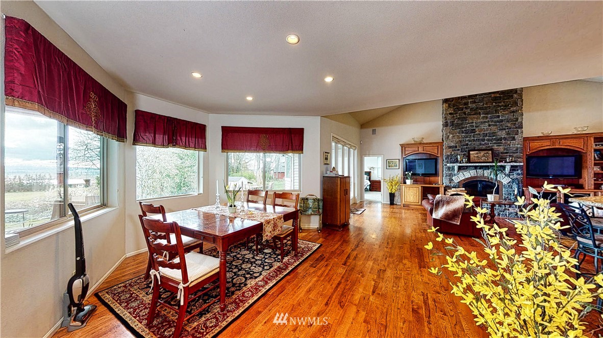 4830 Fobes Road Snohomish, WA 98290 - Photo 21 of 35 a very nice looking living room with a large window and dining table