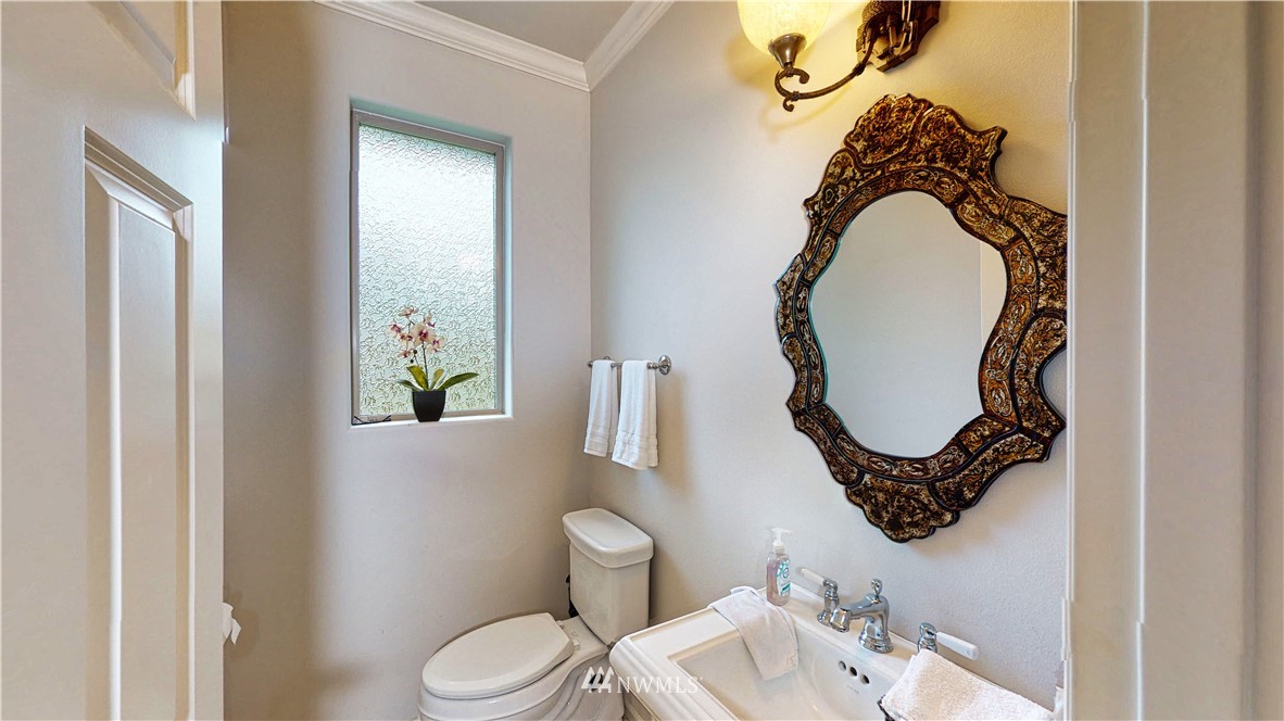 4830 Fobes Road Snohomish, WA 98290 - Photo 26 of 35 a bathroom with a toilet and a mirror