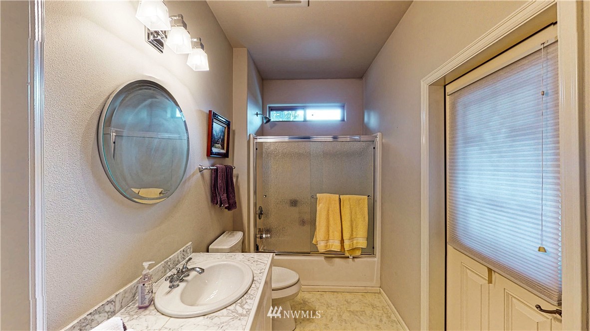 4830 Fobes Road Snohomish, WA 98290 - Photo 27 of 35 a bathroom with a sink and a mirror
