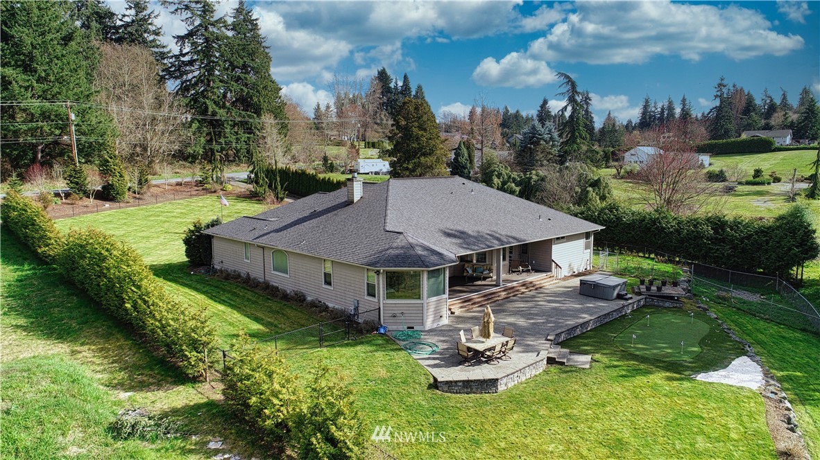 4830 Fobes Road Snohomish, WA 98290 - Photo 5 of 35 a view of a house with backyard garden and sitting area
