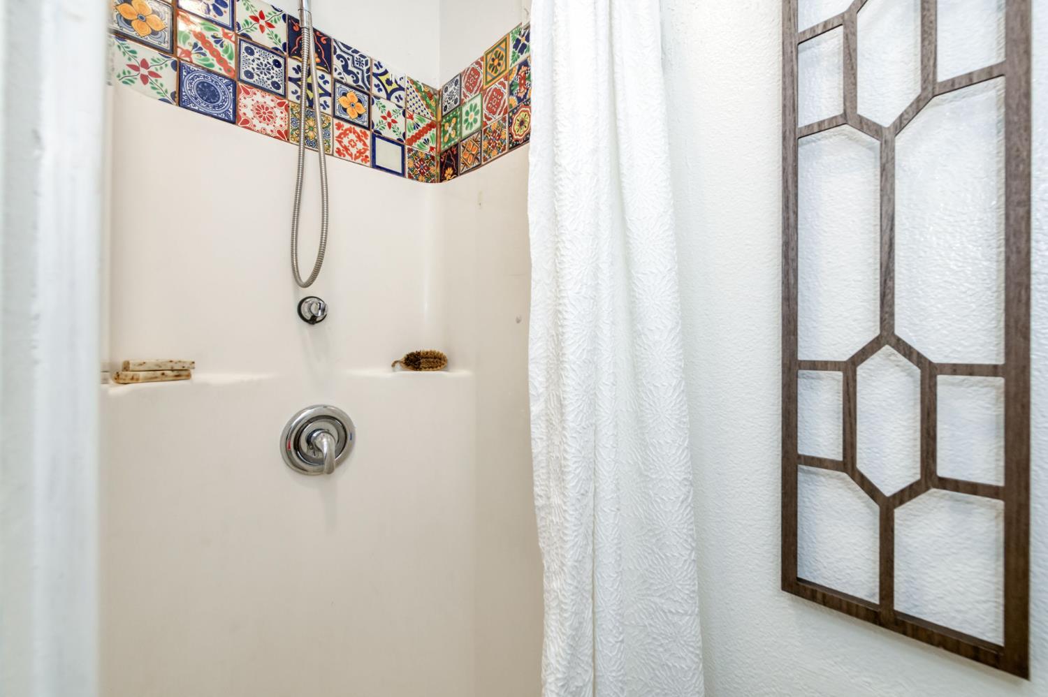 2414 Snyder Street Selma, CA 93662 - Photo 12 of 28 a bathroom with a shower