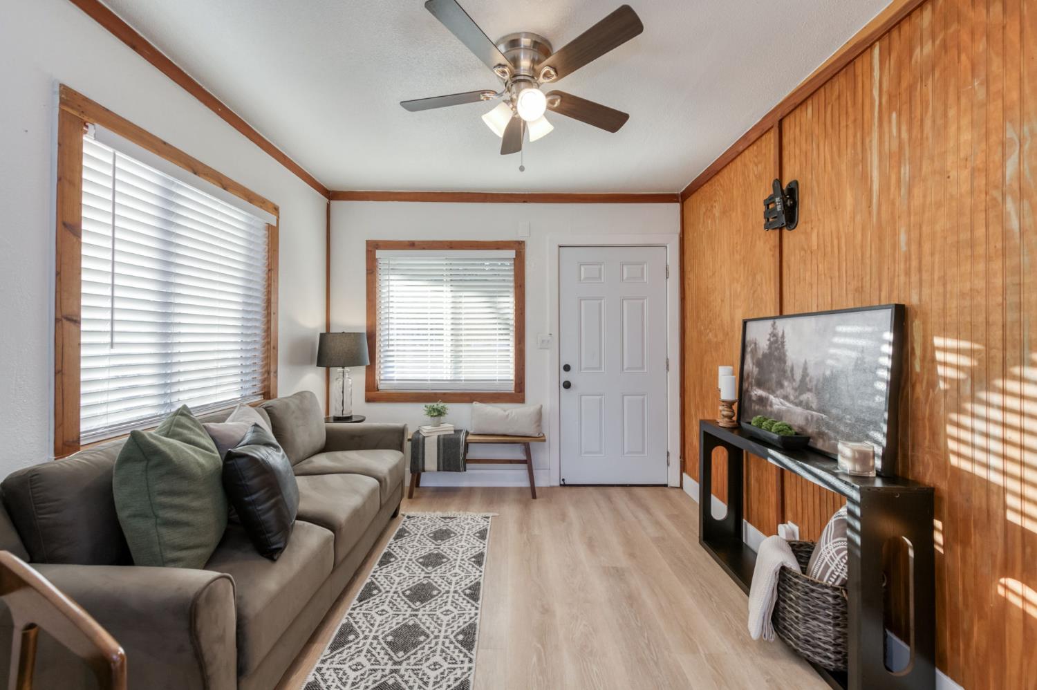 2414 Snyder Street Selma, CA 93662 - Photo 2 of 28 a living room with furniture and a flat screen tv