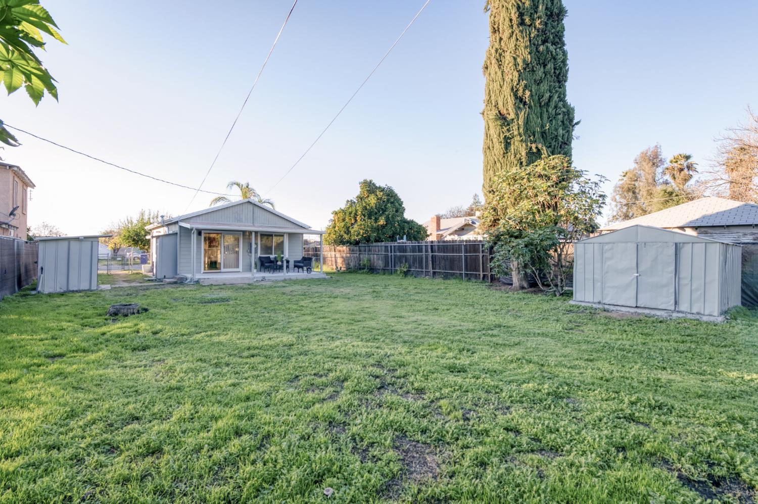 2414 Snyder Street Selma, CA 93662 - Photo 22 of 28 a front view of a house with a yard