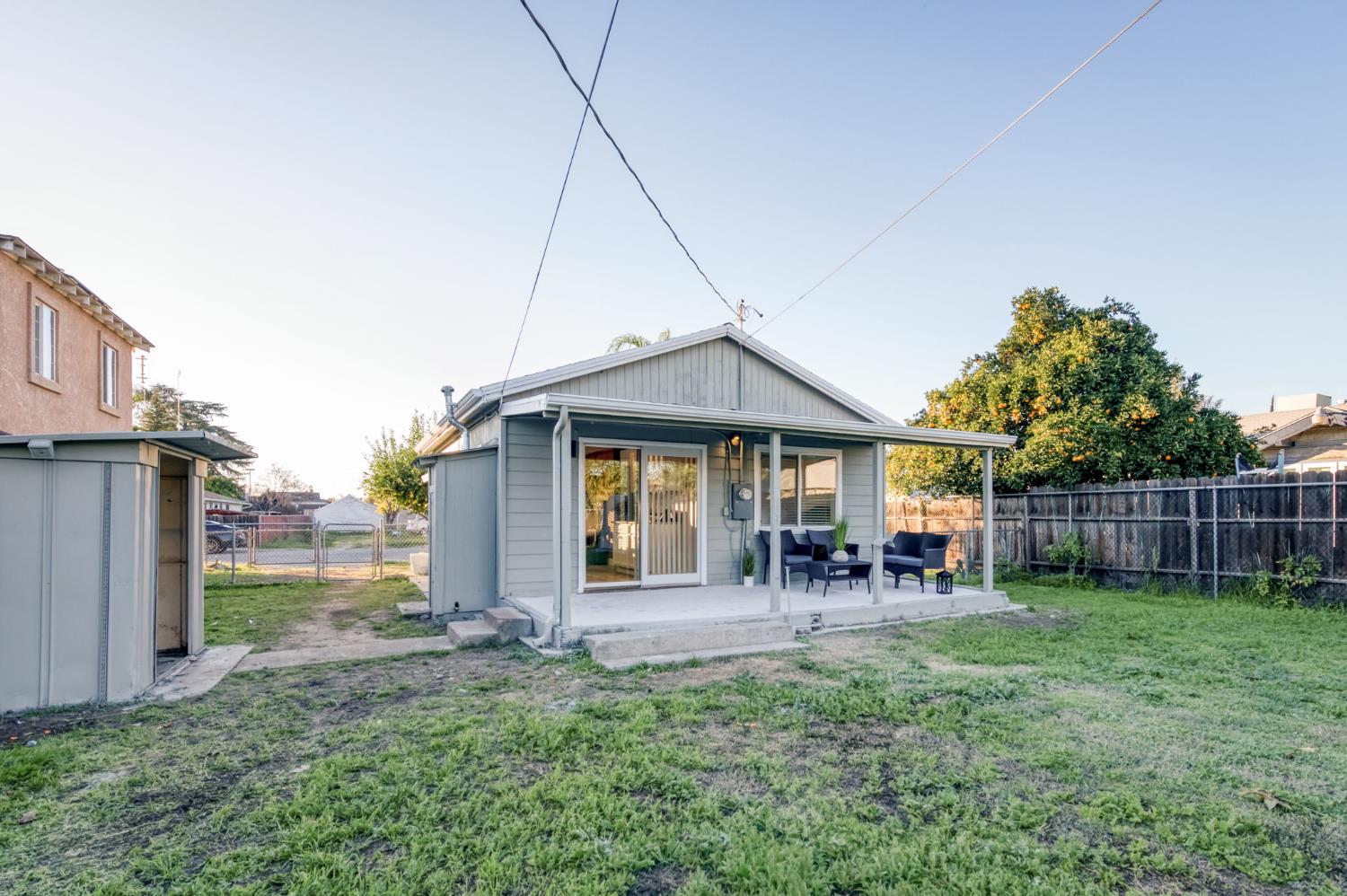 2414 Snyder Street Selma, CA 93662 - Photo 23 of 28 a front view of house with yard and seating space