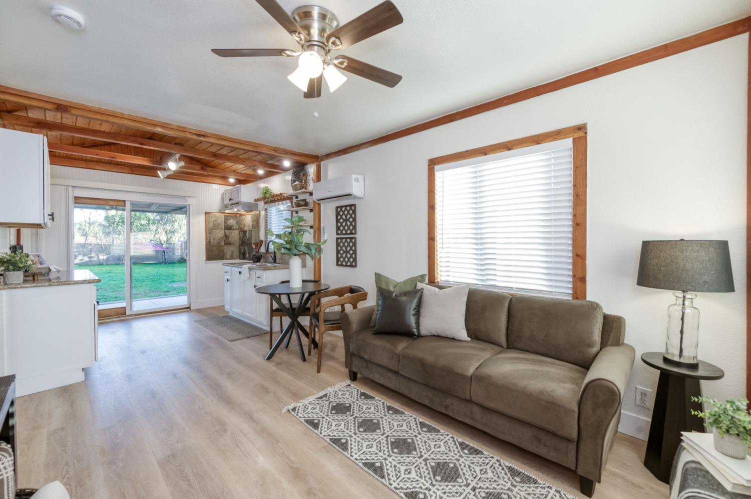 2414 Snyder Street Selma, CA 93662 - Photo 4 of 28 a living room with furniture and a large window