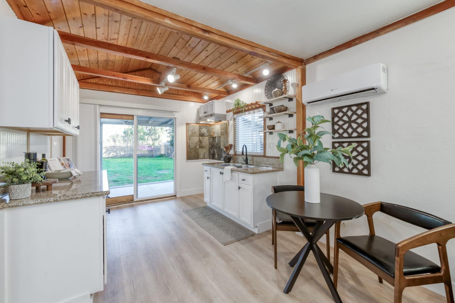 2414 Snyder Street Selma, CA 93662 - Photo 5 of 28 a dining room with furniture and wooden floor