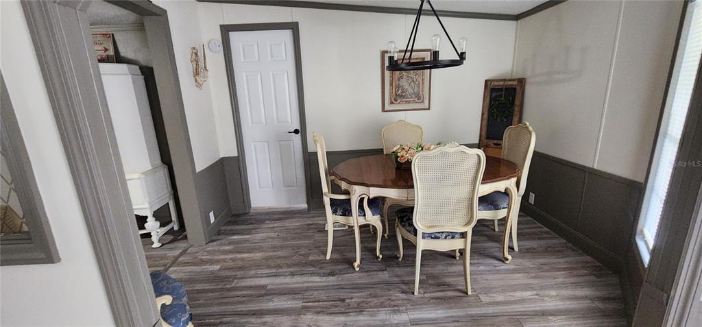 19865 Southwest 5th Place Dunnellon, FL 34431 - Photo 31 of 78 a dining room with furniture window wooden floor