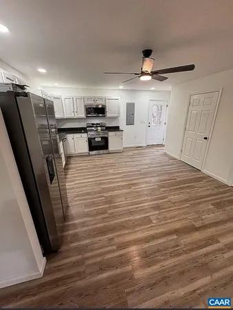 a view of a kitchen with a sink