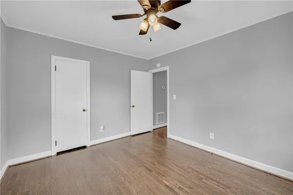 a view of an empty room and window
