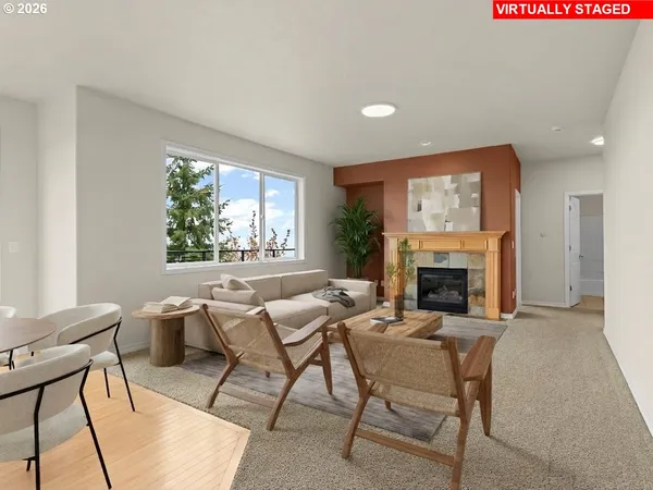 a dining room with furniture and a fireplace