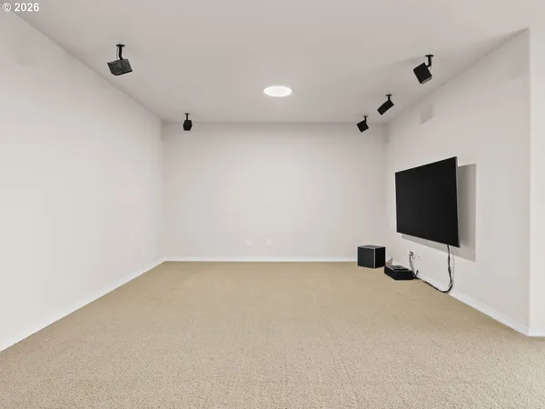 a view of room with flat screen tv