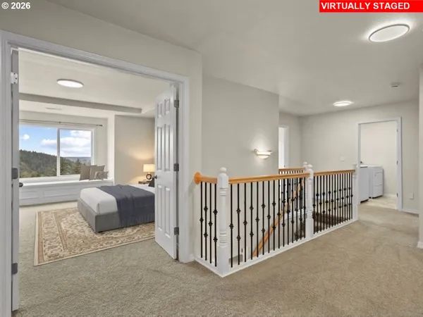 a view of a livingroom with furniture and windows
