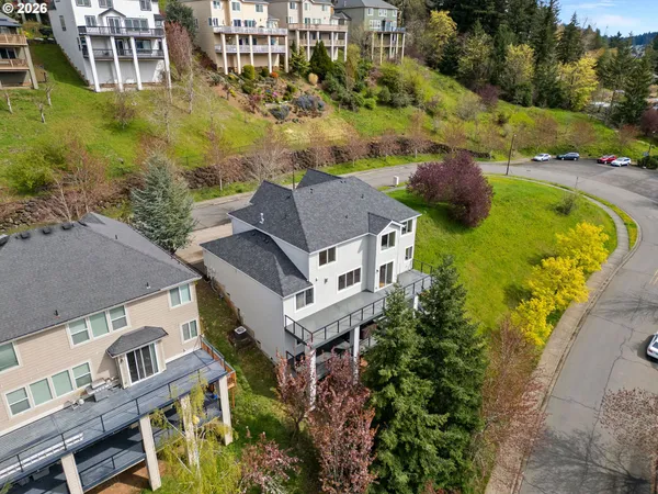 an aerial view of a house with a garden