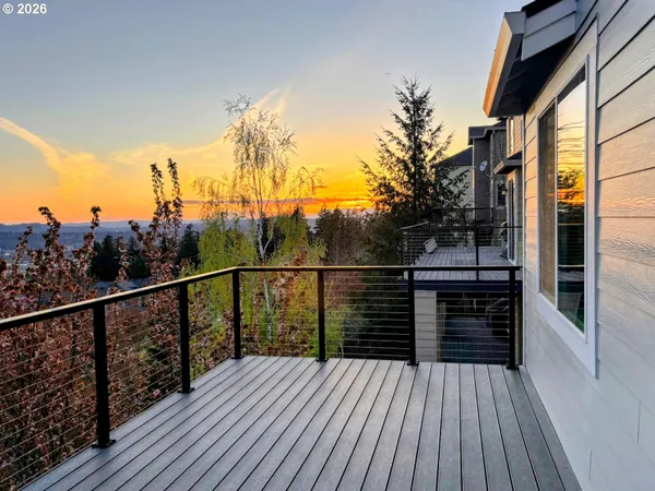a view of balcony and wooden floor