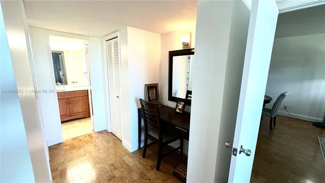 a view of a bedroom from a hallway