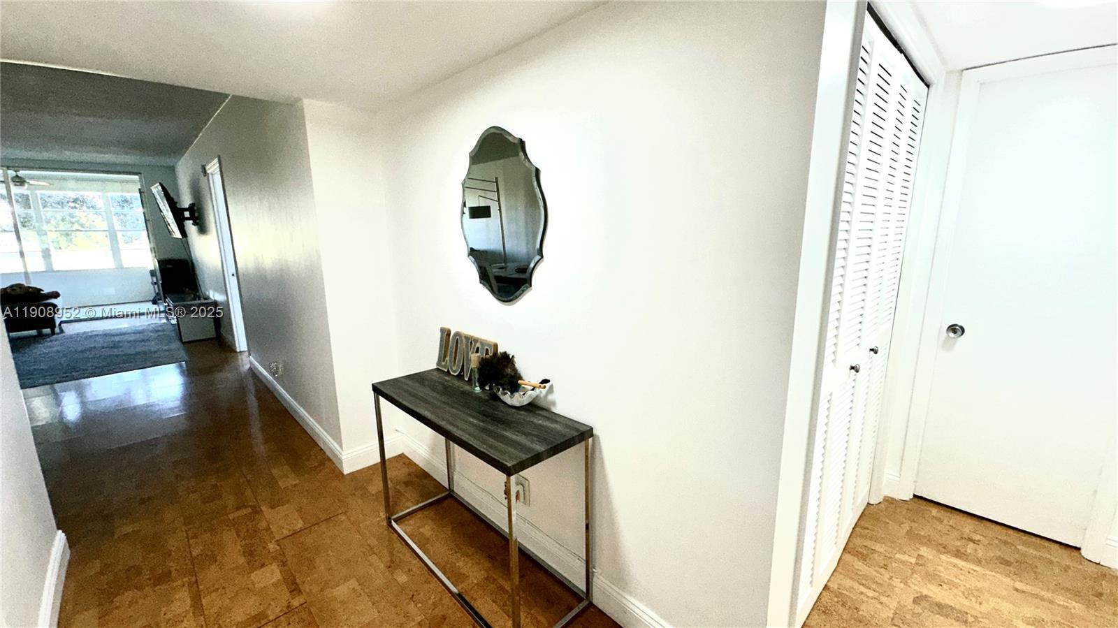2651 South Course Drive, Unit 307 Pompano Beach, FL 33069 - Photo 24 of 33 a view of hallway with seating area